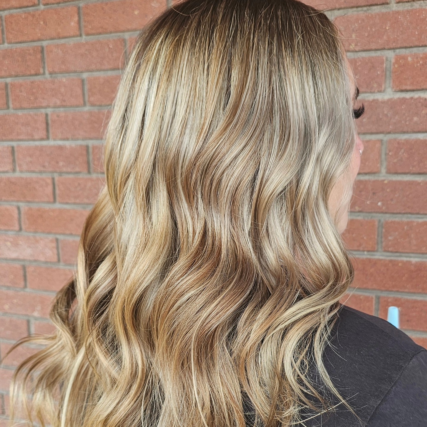 Dimensional blonde with warm honey lowlights.